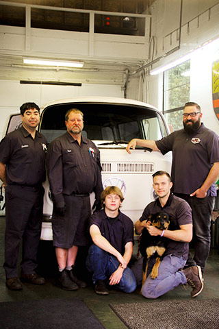 Trafton's Foreign Auto Team in Shop with VW